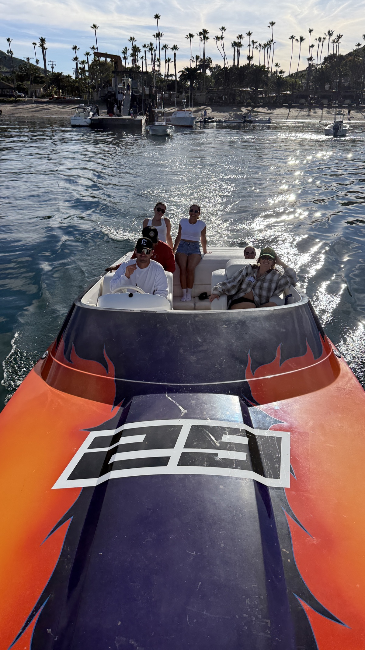 Top-down view of race boat #29 with crew aboard