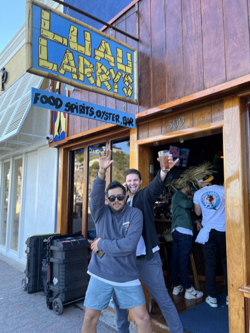 Two guys celebrating outside Luau Larry's bar in Avalon