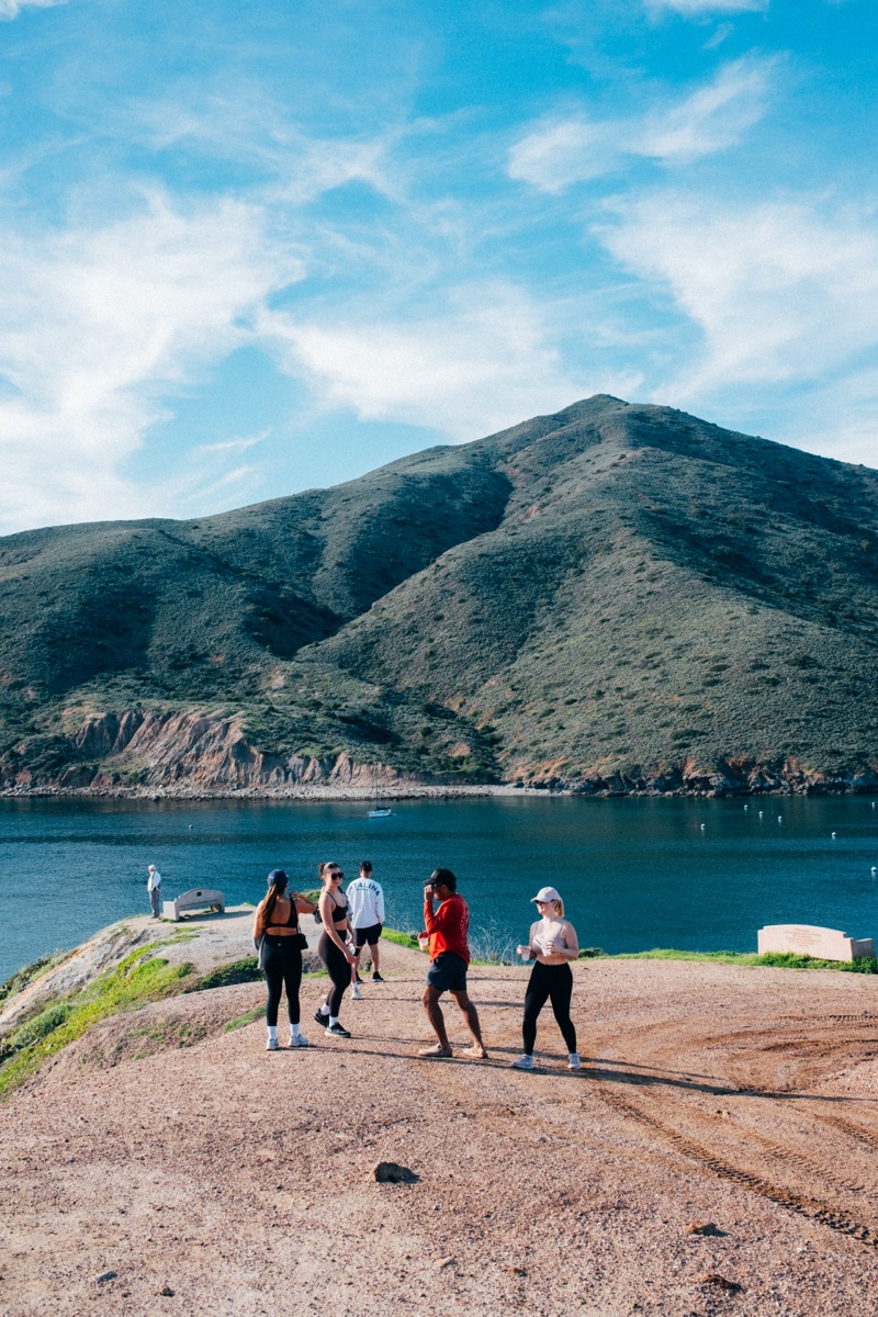 Group of friends at scenic overlook above Catalina Island harbor